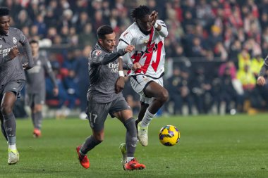 Madrid, Spain - December 14, 2024: League match between Rayo Vallecano and Real Madrid played in the Vallecas neighborhood. Soccer players. league 2024, league 2025. clipart