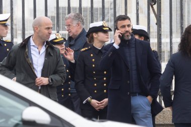 Cadiz, Spain - January 10, 2025: The Princess of Asturias goes out to eat with some shipmates at a restaurant in the center of Cadiz before boarding. Princess of Asturias in uniform. clipart