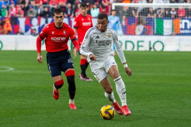 Pamplona, Spain - February 15, 2025: League match between Osasuna and Real Madrid played in Pamplona. Real Madrid players. European champions. League 2024, 2025 clipart