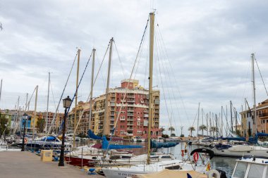 Alboraya, Spain - February 22, 2025: Fishing village of Alboraya in Valencia. Water channels. Village with colorful houses and port with canals in its streets. Small boats. Sea port. clipart