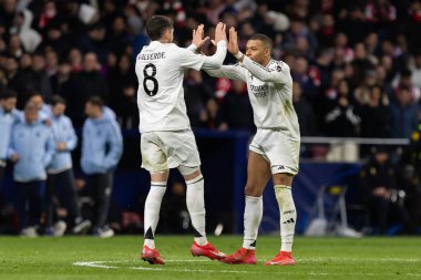 Madrid, İspanya - 12 Mart 2025: Madrid 'de Atletico Madrid ile Real Madrid arasında oynanan Şampiyonlar Ligi maçı. Gerçek Madrid oyuncuları. Avrupa şampiyonları. İspanyol Euroderby.