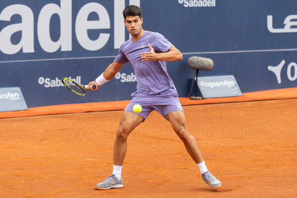 Barcelona, Spain- April 12, 2025: Conde de God tennis tournament held in Barcelona. ATP 500. Tennis competition. Professional tennis players. Tennis courts. Carlos Alcaraz on a dirt track.