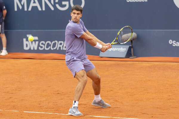 Barcelona, Spain- April 12, 2025: Conde de God tennis tournament held in Barcelona. ATP 500. Tennis competition. Professional tennis players. Tennis courts. Carlos Alcaraz on a dirt track.