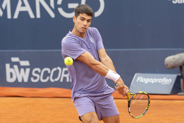 Barcelona, Spain- April 12, 2025: Conde de God tennis tournament held in Barcelona. ATP 500. Tennis competition. Professional tennis players. Tennis courts. Carlos Alcaraz on a dirt track.