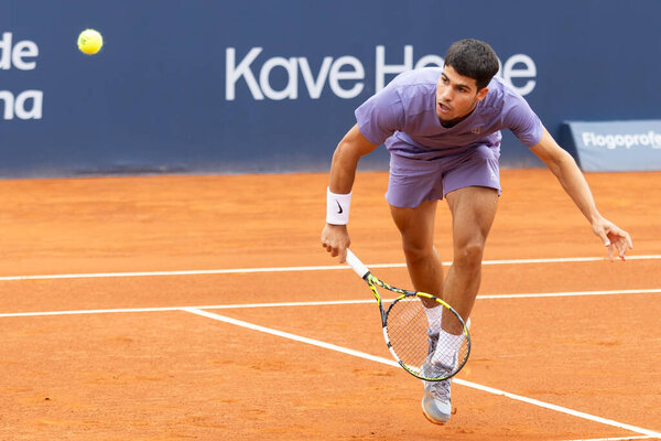 Barcelona, Spain- April 12, 2025: Conde de God tennis tournament held in Barcelona. ATP 500. Tennis competition. Professional tennis players. Tennis courts. Carlos Alcaraz on a dirt track.