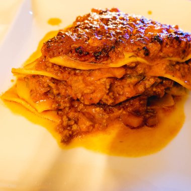 Close up from a piece of lasagne bolognese.