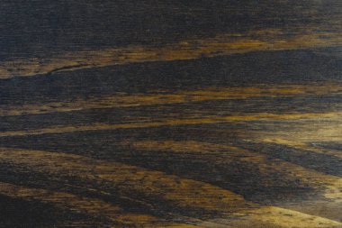 Koyu bir ahşaptan, bir sürü deseni olan soyut arkaplan fotoğrafı. .