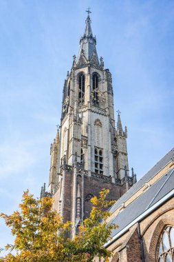 Delft, The Netherlands October 15, 2024. The tower of the New church in Delft. clipart