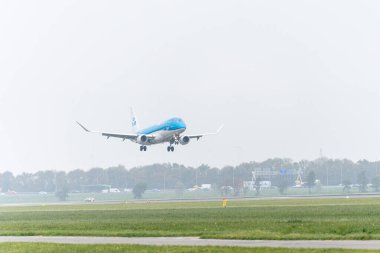 November 8, 2024. Schiphol, Netherlands. A KLM plane land at Schiphol. clipart