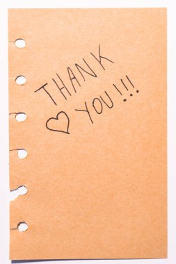 Kahverengi kağıda bir teşekkür notu, beyaz arka planda.