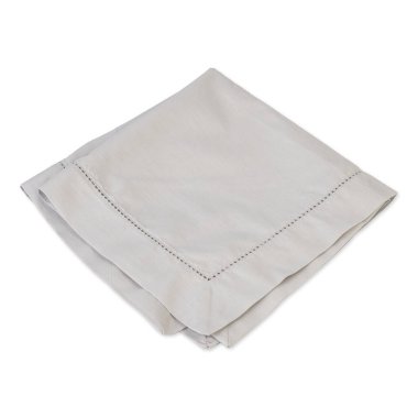 Folded grey tissue napkin isolated over white background.