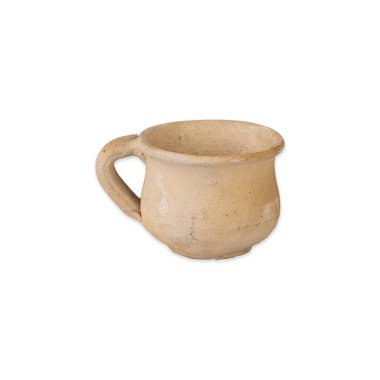 Rustic handmade clay cup isolated over white background.