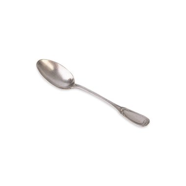 Old decorated metal tea spoon isolated over white background.
