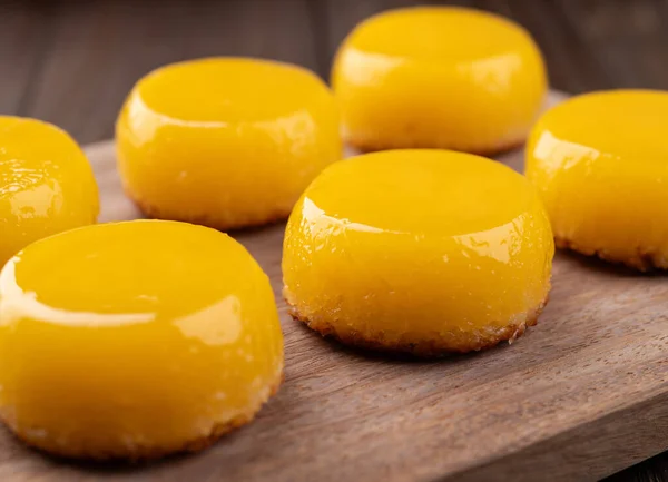 stock image Closeup of quindins, traditional egg and coconut brazilian dessert.