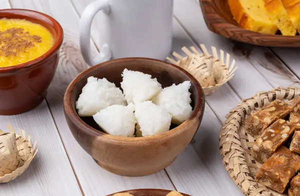 stock image Typical brazilian june festival food over white wooden table. Festa junina.