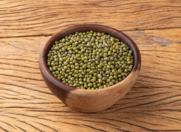 Stock image Moyashi beans in a bowl over wooden table.