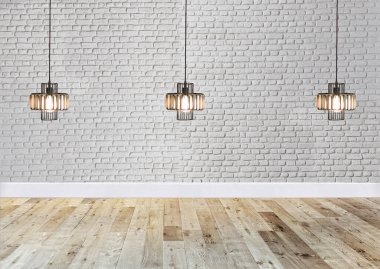 Ahşap zemini ve dekoratif taş duvarı olan boş bir iç tasarım. 3B illüstrasyon