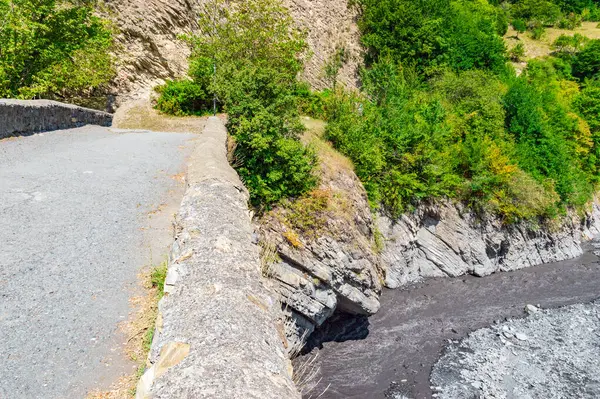 stock image Old stone bridge named Ulu Korpu was built in the 18th century near Ilisu village, northwest Azerbaijan