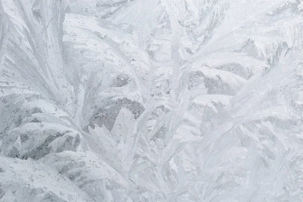 凍った氷のパターン冬の窓の背景 ロイヤリティフリーのストック画像