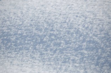 Sert desenli taze beyaz kar yüzeyi arkaplanı