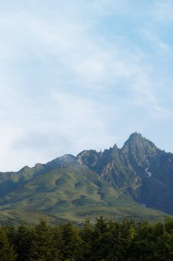 Mt Rishiri summer mountain landscape and white clouds, Hokkaido, Japan clipart