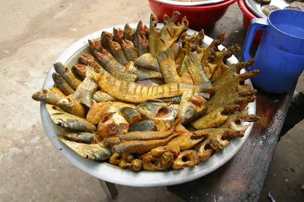 Fish fry street food. Marinated fish with salt pepper chilli and turmeric powder.