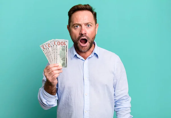 Middle Age Man Looking Very Shocked Surprised Dollar Banknotes Concept — Stockfoto
