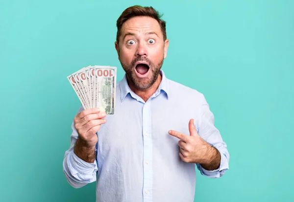 Middle Age Man Feeling Happy Pointing Self Excited Dollar Banknotes — Stockfoto