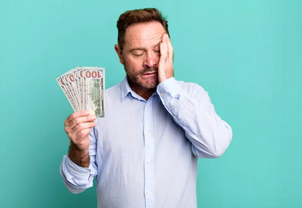 Middle Age Man Feeling Bored Frustrated Sleepy Tiresome Dollar Banknotes — Stockfoto