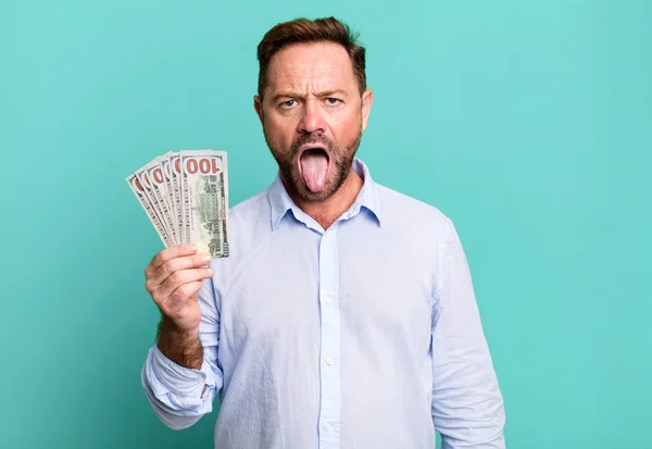 Middle Age Man Feeling Disgusted Irritated Tongue Out Dollar Banknotes — Stockfoto