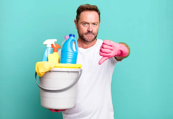 Middle Age Man Feeling Cross Showing Thumbs Housekeeper Clean Products — Stock Photo, Image