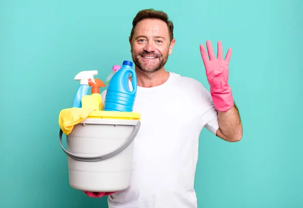 Middle Age Man Smiling Looking Friendly Showing Number Four Housekeeper — Stock Photo, Image