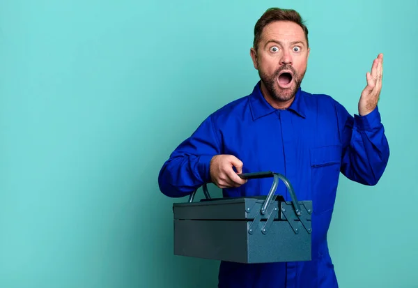 Middle Age Man Feeling Extremely Shocked Surprised Plumber Toolbox Concept — Stock Photo, Image