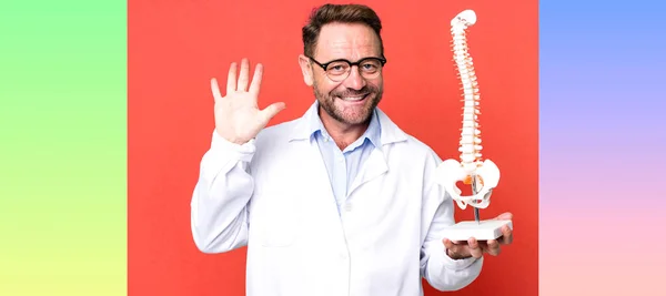 Middle Age Man Smiling Looking Friendly Showing Number Five Physician — Stock Photo, Image