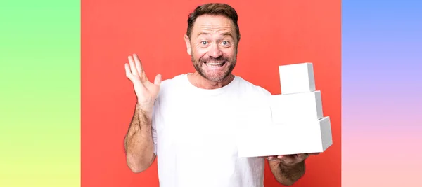 Middle Age Man Feeling Happy Astonished Something Unbelievable Blank Packages — Stock Photo, Image
