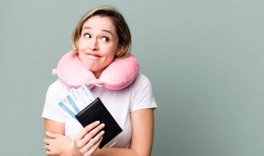 shrugging, feeling confused and uncertain. flight passenger concept