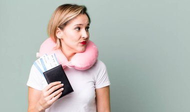 on profile view thinking, imagining or daydreaming. flight passenger concept