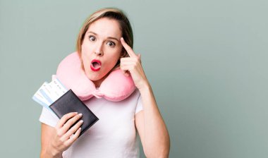 looking surprised, realizing a new thought, idea or concept. flight passenger concept