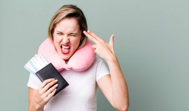 looking unhappy and stressed, suicide gesture making gun sign. flight passenger concept