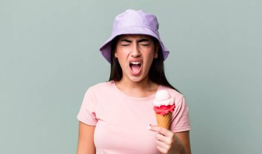 shouting aggressively, looking very angry. ice cream and summer concept