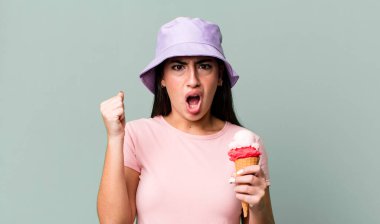 shouting aggressively with an angry expression. ice cream and summer concept