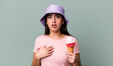 looking shocked and surprised with mouth wide open, pointing to self. ice cream and summer concept