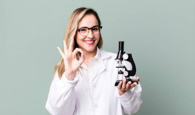 scients student with a microscope