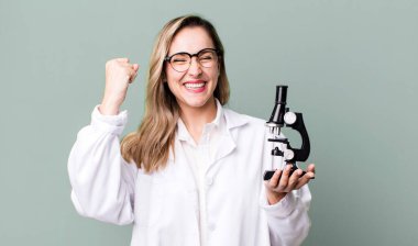 scients student with a microscope