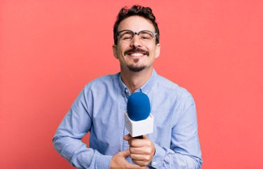 adult man journalist or presenter with a microphone