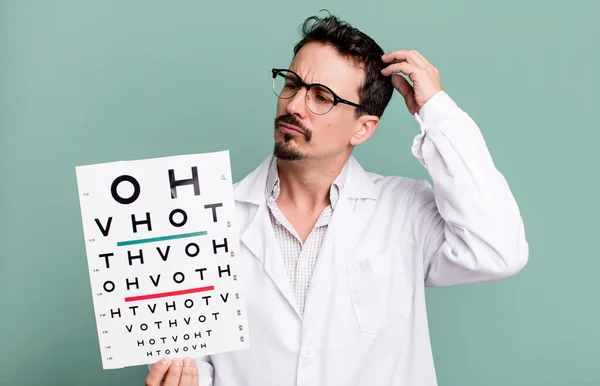 Adult Man Smiling Happily Daydreaming Doubting Optical Vision Test Concept — Photo