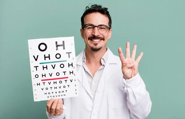 Adult Man Smiling Looking Friendly Showing Number Four Optical Vision — Stockfoto