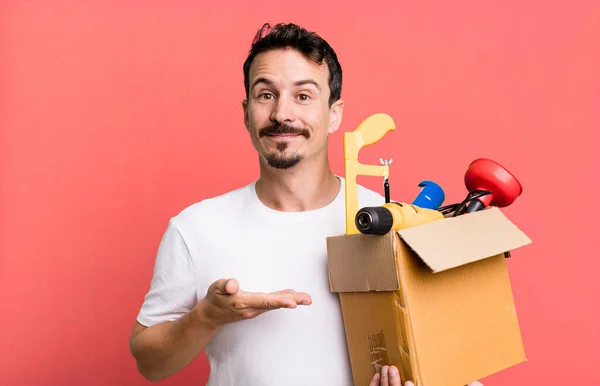 Adult Man Smiling Cheerfully Feeling Happy Showing Concept Toolbox Handyman — Stock fotografie