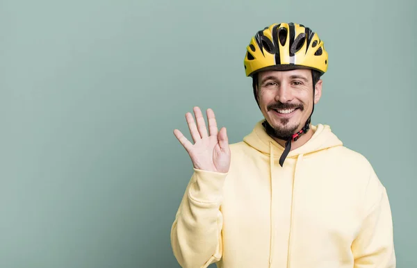Adult Man Smiling Happily Waving Hand Welcoming Greeting You Bike — Stockfoto