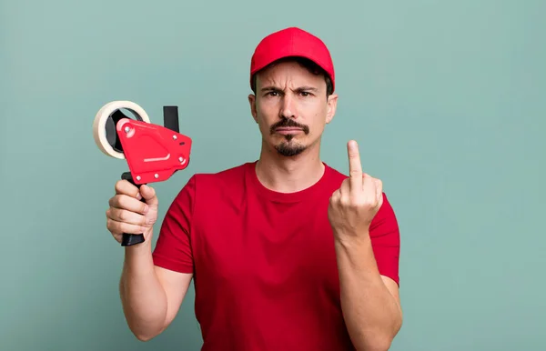 Adult Man Feeling Angry Annoyed Rebellious Aggressive Deliveryman Packer Concept — Stok fotoğraf